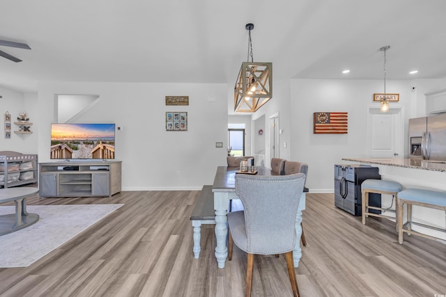 dining room with light wood-style flooring, recessed lighting, ceiling fan, and baseboards