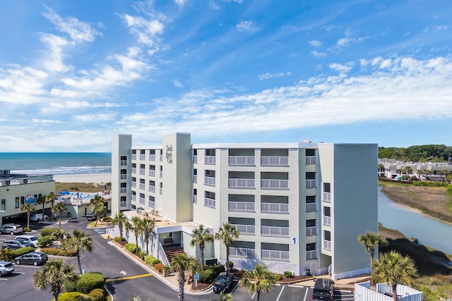 9400 Shore Dr Unit 206, Myrtle Beach, SC 29572 - view of property with uncovered parking and a water view