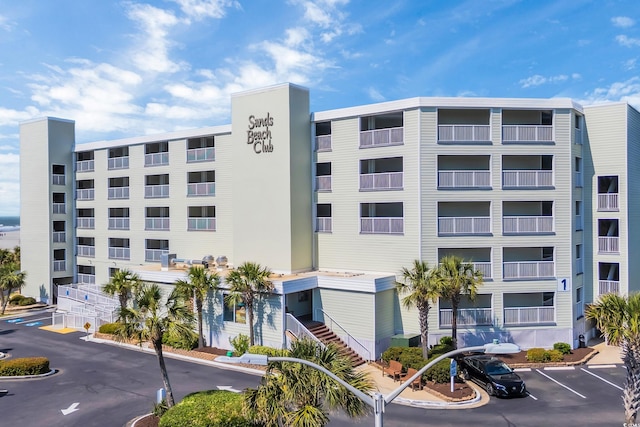 9400 Shore Dr Unit 206, Myrtle Beach, SC 29572 - view of apartment building / complex with uncovered parking