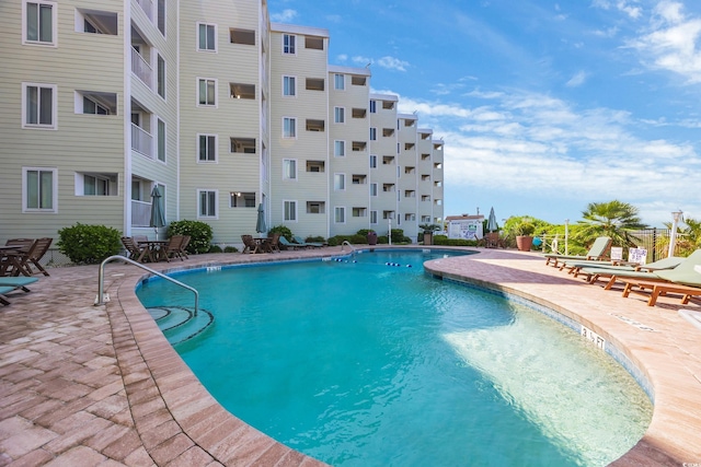 9400 Shore Dr Unit 206, Myrtle Beach, SC 29572 - community pool featuring a patio