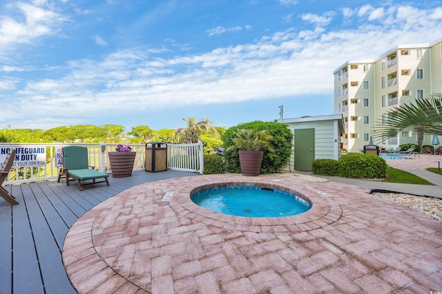 9400 Shore Dr Unit 206, Myrtle Beach, SC 29572 - view of swimming pool with a community hot tub and a deck
