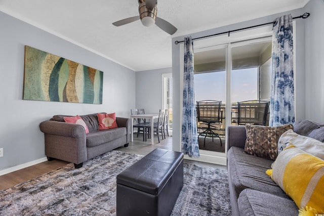 9400 Shore Dr Unit 206, Myrtle Beach, SC 29572 - living area with wood finished floors, ceiling fan, and baseboards