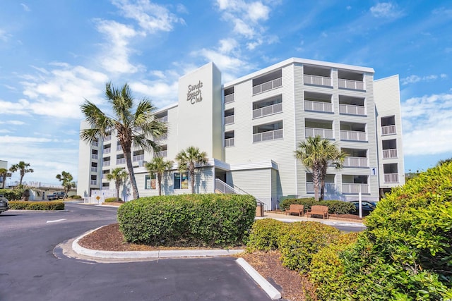 9400 Shore Dr Unit 206, Myrtle Beach, SC 29572 - view of apartment building / complex with uncovered parking