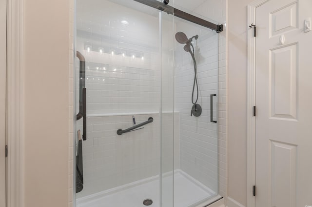 bathroom with a stall shower