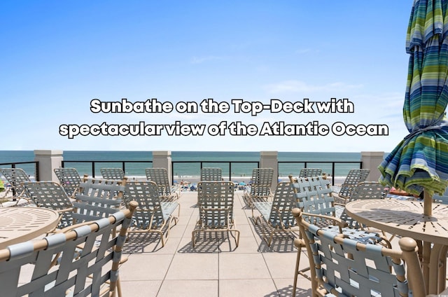 view of patio / terrace with a water view