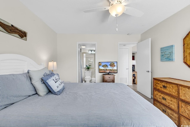 bedroom featuring ensuite bath and ceiling fan