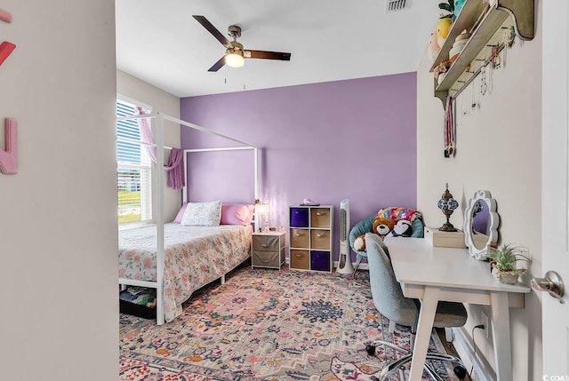 bedroom featuring carpet and a ceiling fan
