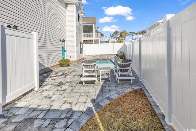 view of patio with a fenced backyard, central AC, and ceiling fan