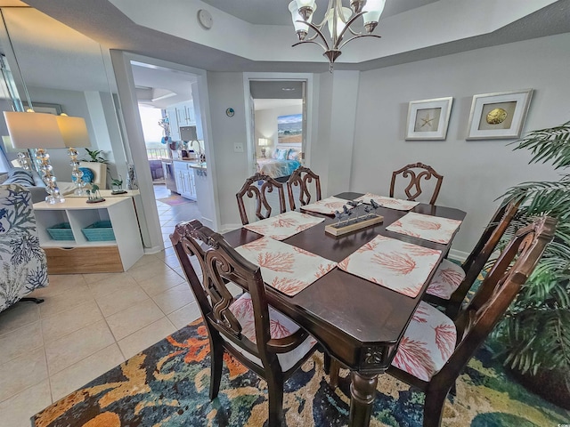 9650 Shore Dr Unit 1203, Myrtle Beach, SC 29572 - dining room featuring light tile patterned floors and a chandelier