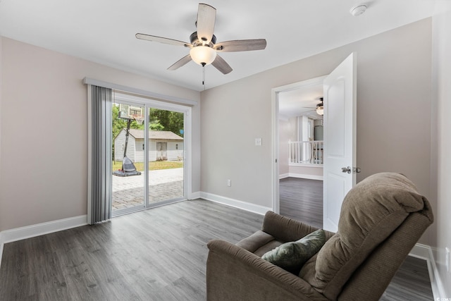 1720 Horry St, Conway, SC 29526 - living area with a ceiling fan, baseboards, and wood finished floors