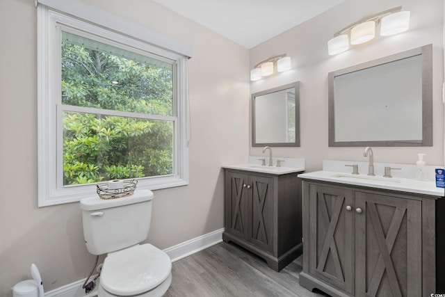 1720 Horry St, Conway, SC 29526 - bathroom featuring vanity, wood finished floors, toilet, and baseboards