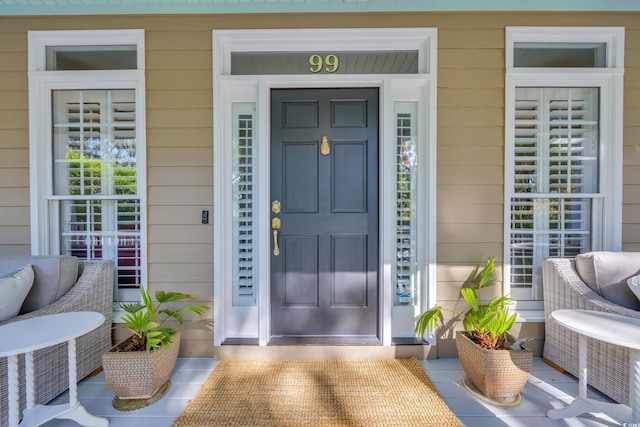 entrance to property with a porch