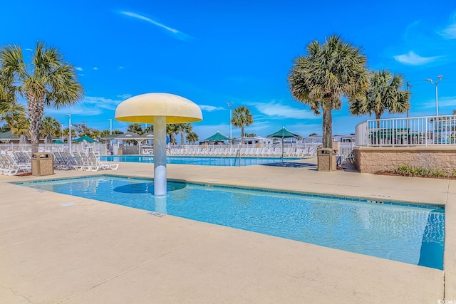 6001-8026 S Kings Hwy, Myrtle Beach, SC 29575 - community pool featuring fence and a patio