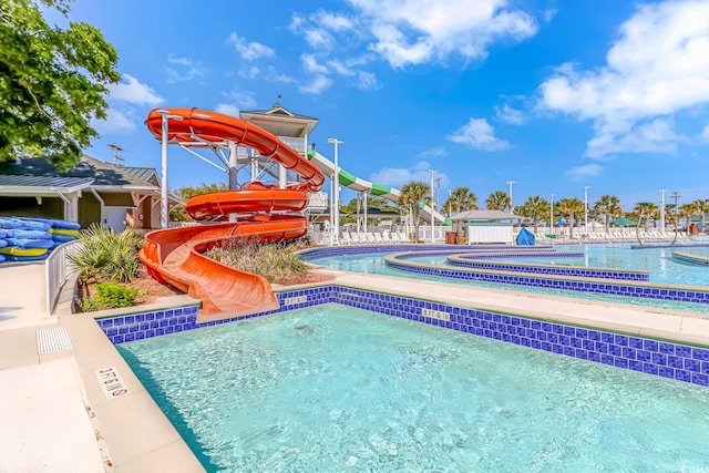 6001-8026 S Kings Hwy, Myrtle Beach, SC 29575 - community pool featuring a hot tub and a water slide