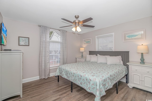 6001-8026 S Kings Hwy, Myrtle Beach, SC 29575 - bedroom with wood finished floors, baseboards, and ceiling fan