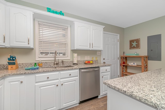 6001-8026 S Kings Hwy, Myrtle Beach, SC 29575 - kitchen featuring dishwasher, electric panel, a sink, light wood-style floors, and white cabinets