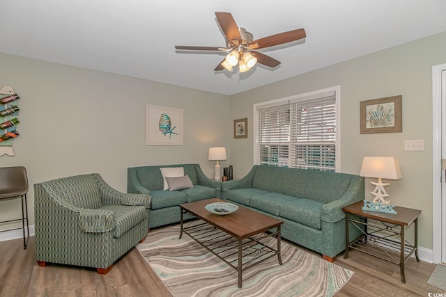 6001-8026 S Kings Hwy, Myrtle Beach, SC 29575 - living room featuring wood finished floors, a ceiling fan, and baseboards