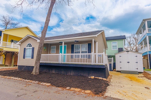 6001-8026 S Kings Hwy, Myrtle Beach, SC 29575 - view of front facade with a shed, covered porch, an outdoor structure, and central air condition unit