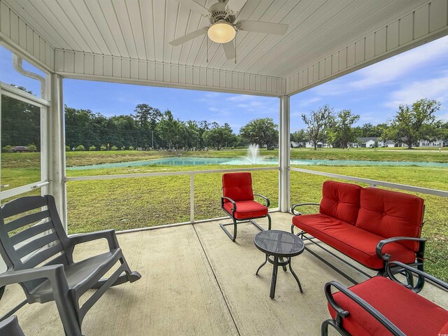 garage with a garage door opener and electric panel