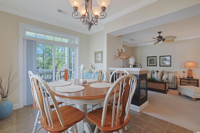 719 Shearwater Ct Unit 301, Murrells Inlet, SC 29576 - carpeted dining area with crown molding, tile patterned flooring, a chandelier, baseboards, and a ceiling fan