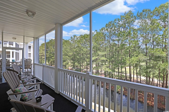 719 Shearwater Ct Unit 301, Murrells Inlet, SC 29576 - sunroom / solarium with view of wooded area