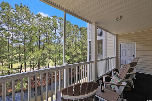 719 Shearwater Ct Unit 301, Murrells Inlet, SC 29576 - balcony featuring view of wooded area