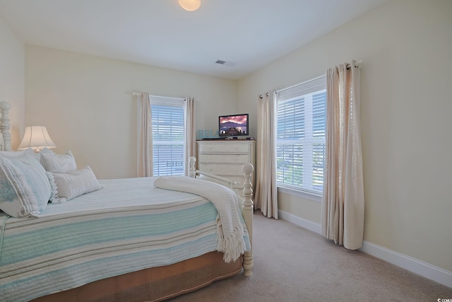 719 Shearwater Ct Unit 301, Murrells Inlet, SC 29576 - bedroom with light carpet and baseboards