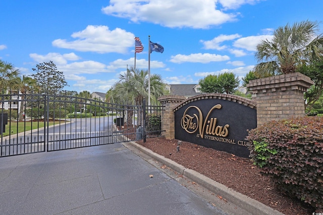 719 Shearwater Ct Unit 301, Murrells Inlet, SC 29576 - community sign featuring a gate and driveway