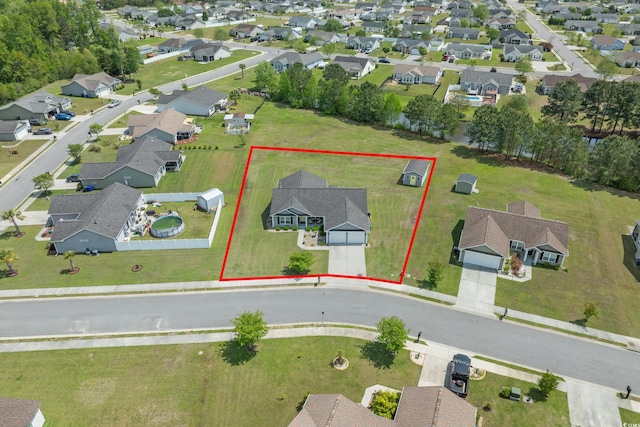 aerial view of residential area featuring property boundaries highlighted