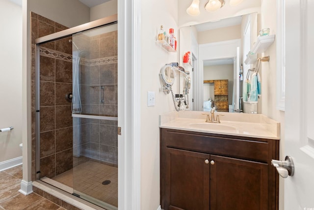 1681 Suncrest Dr, Myrtle Beach, SC 29577 - bathroom with a stall shower, vanity, baseboards, and tile patterned flooring