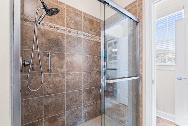 1681 Suncrest Dr, Myrtle Beach, SC 29577 - bathroom featuring a shower stall, plenty of natural light, and baseboards