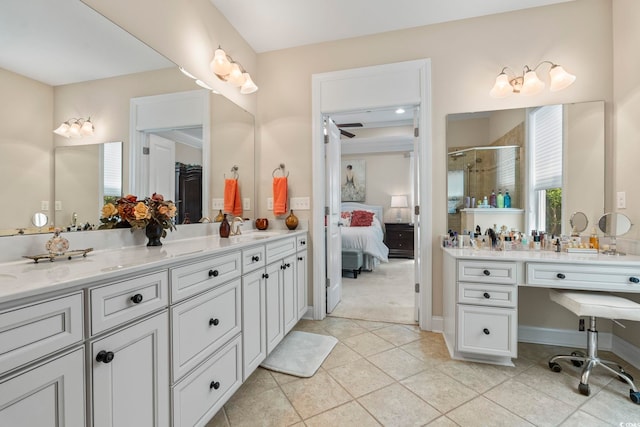 1681 Suncrest Dr, Myrtle Beach, SC 29577 - ensuite bathroom with a stall shower, tile patterned flooring, double vanity, and baseboards