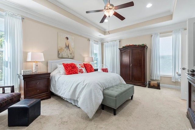 1681 Suncrest Dr, Myrtle Beach, SC 29577 - bedroom with multiple windows, light carpet, crown molding, a raised ceiling, and recessed lighting