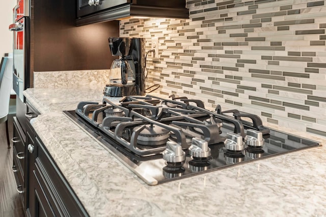 1681 Suncrest Dr, Myrtle Beach, SC 29577 - kitchen view of backsplash, black gas stovetop, and light countertops