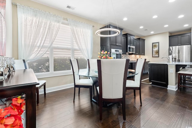 1681 Suncrest Dr, Myrtle Beach, SC 29577 - dining area with baseboards, dark wood-style floors, and recessed lighting