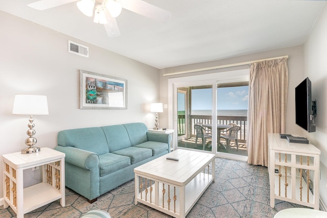 living room with ceiling fan