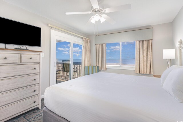 bedroom with access to outside and ceiling fan