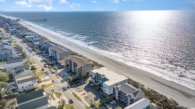 bird's eye view of waterfront with a beach