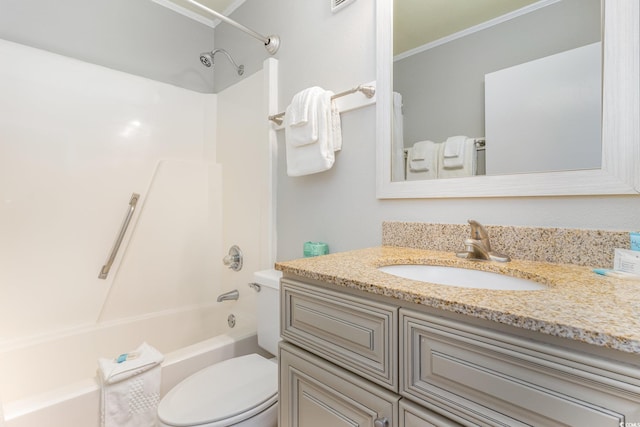 bathroom featuring toilet, tub / shower combination, vanity, and crown molding