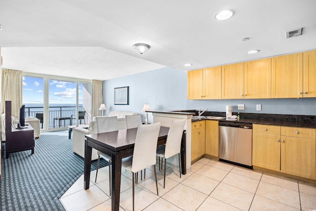 107 S Ocean Blvd Unit 1402, Myrtle Beach, SC 29577 - kitchen featuring dishwasher, light brown cabinetry, a peninsula, a sink, and recessed lighting