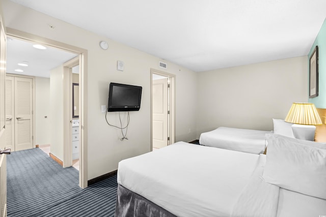 107 S Ocean Blvd Unit 1402, Myrtle Beach, SC 29577 - bedroom with dark carpet and baseboards