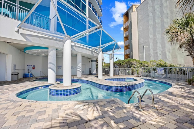 107 S Ocean Blvd Unit 1402, Myrtle Beach, SC 29577 - view of pool with fence, a patio area, and a pool with connected hot tub