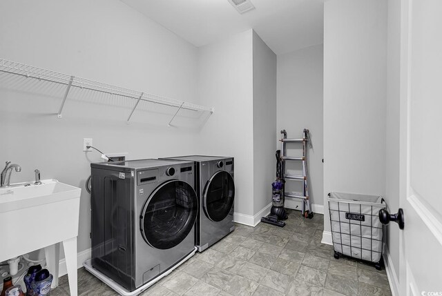 6239 Chadderton Cir, Myrtle Beach, SC 29579 - laundry area with washer and dryer and baseboards