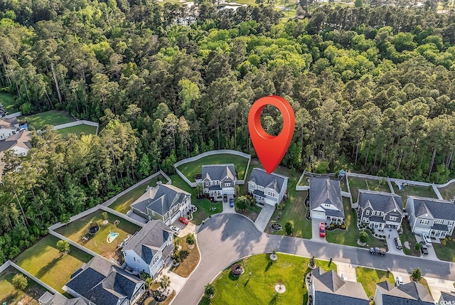6239 Chadderton Cir, Myrtle Beach, SC 29579 - aerial view of property's location with nearby suburban area and a heavily wooded area