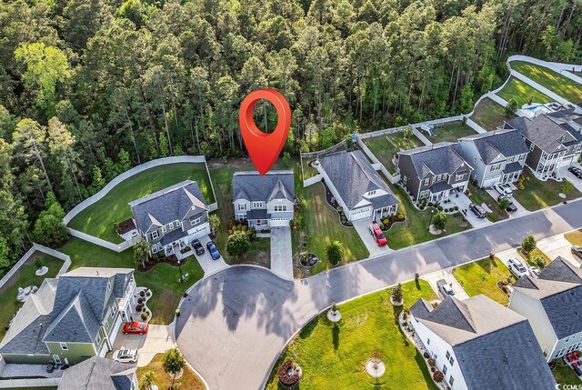 6239 Chadderton Cir, Myrtle Beach, SC 29579 - aerial view of residential area with a heavily wooded area