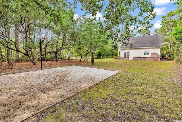1729 Longleaf Dr, Myrtle Beach, SC 29575 - view of grassy yard with basketball hoop