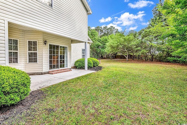 1729 Longleaf Dr, Myrtle Beach, SC 29575 - view of green lawn with a patio area