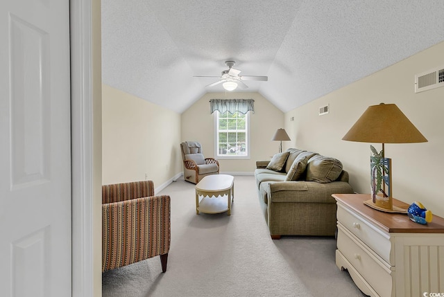 1729 Longleaf Dr, Myrtle Beach, SC 29575 - living area featuring light carpet, a ceiling fan, a textured ceiling, vaulted ceiling, and baseboards