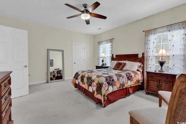 1729 Longleaf Dr, Myrtle Beach, SC 29575 - bedroom featuring light colored carpet, baseboards, and ceiling fan