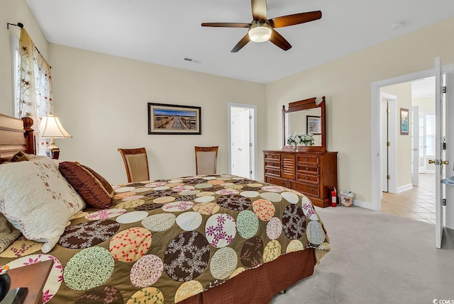 1729 Longleaf Dr, Myrtle Beach, SC 29575 - bedroom featuring carpet floors, ceiling fan, baseboards, and tile patterned flooring